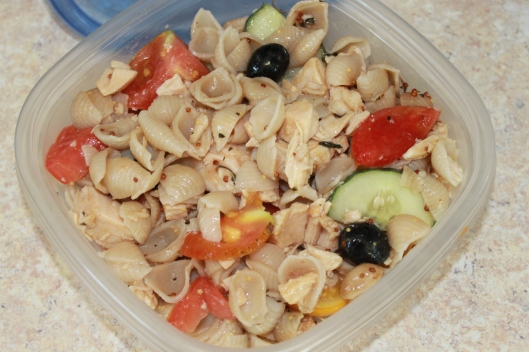Today's pasta dish: gluten free pasta, olives, tomatoes, and cucumbers.